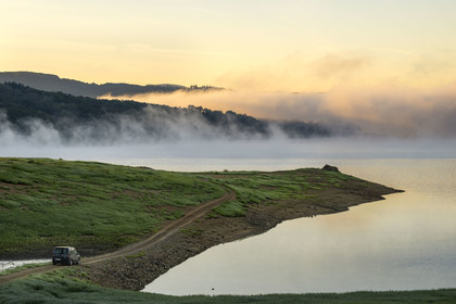 France, Nievre, Regional Natural Park of Morvan, Chaumard, Pannecière lake in the early morning mist