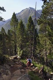 France, Hautes Pyrenees, Saint Lary Soulan and Aragnouet, Neouvielle National Nature Reserve, Neouvielle lakes hike, hikers climbing to the Lacs des Laquettes
