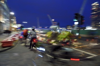 United Kingdom, London, cyclist running on Victoria embankment