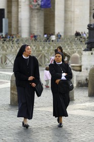 Italy, Lazio, Rome, Vatican City listed as World Heritage by UNESCO, nun on St Peter's Square