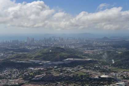 Panama, Panama City skyscrapers and its suburb in the foreground (aerial view)