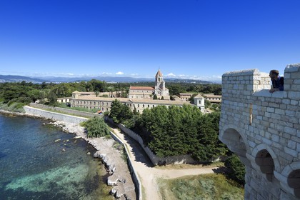 France, Alpes-Maritimes, Lerins Islands, Saint-Honorat island, Abbey of Lerins, former fortified monastery raised in 1073 and the abbey church in the background