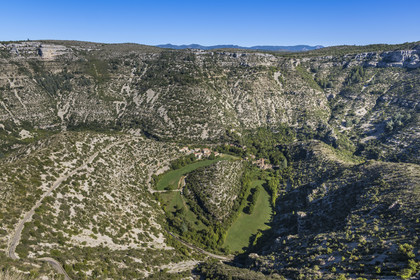 France, Herault, the Causses and the Cevennes, Mediterranean agro pastoral cultural landscape, listed as World Heritage by UNESCO, Saint Maurice Navacelles, Cirque de Navacelles, the rock of the Virgin is surrounded by a oxbow of the river La Vis