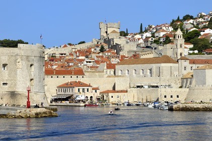 Croatia, Dalmatia, Dalmatian coast, Dubrovnik, Historic Centre listed as World Heritage by UNESCO, the ramparts on the sea side, the Saint Jean Tower building at the entrance to the Port left and the Minceta Tower in the background