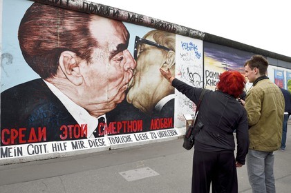 Germany, Berlin, Friedrichshain-Kreuzberg, East Side Gallery, The Wall, work dating from the 1990's, renovated in 2009, entitled Friendship Kiss by artist Dmitri Vrubel, representing General Secretaries Leonid Ilitch Brejnev and Erich Honecker