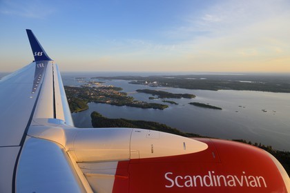 Sweden, Vasterbotten County, SAS flight approaching Umea (aerial view)