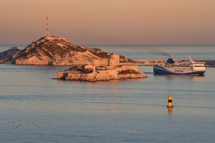 France, Bouches du Rhone, Marseille, Calanques National Park, archipelago of Frioul islands, La Meridionale Ferry arriving from Corsica and the Chateau d'If in the foreground