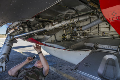 France, Bouches du Rhone, Salon de Provence, air base 701, base of the Patrouille de France (PAF for Patrouille acrobatique de France) of the French Air and Space Force, adjudant Nicolas Renard, the mechanic, takes a tour of his Alphajet, landing gear check