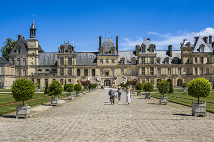 France, Seine-et-Marne, Fontainebleau, castle of Fontainebleau listed as World Heritage by UNESCO, Cour du Cheval blanc, horseshoe staircase made in 1550 by Philibert Delorme then redone between 1632 and 1634 by Jean Androuet du Cerceau, it is composed of two monumental parallel fretted flights of 46 steps