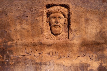 Jordan, Wadi Rum, engraved portrait in the rock of Laurence of Arabia