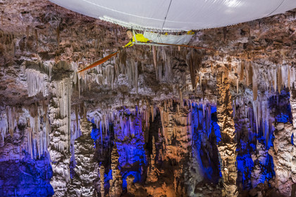 France, Gard, Mejannes-le-Clap, grotte de La Salamandre (Salamander cave), discovery of the cave in Aéroplume®, an individual dirigible balloon inflated with helium which allows you to fly away by flapping your wings