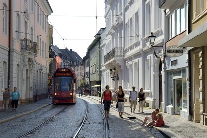 Germany, Baden-Wurttemberg, Freiburg im Breisgau, Salzstrasse, one of the Bächle which are small open channel lining the sidewalks of the old town