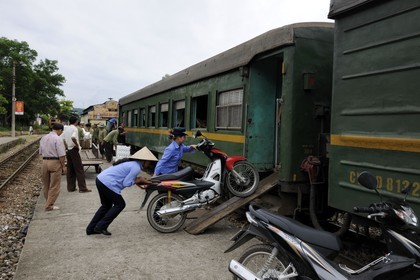 Vietnam, day train from Lao Cai to Hanoi, Yen Bai station, the motorbikes go into a dedicated wagon