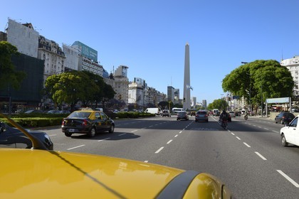 Argentina, Buenos Aires,  the obelisk on 9 de Julio avenue, the widest avenue in the world