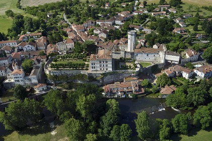 France, Dordogne, Perigord Vert, Bourdeilles, the castle overlooking the village and the Dronne river (aerial view)