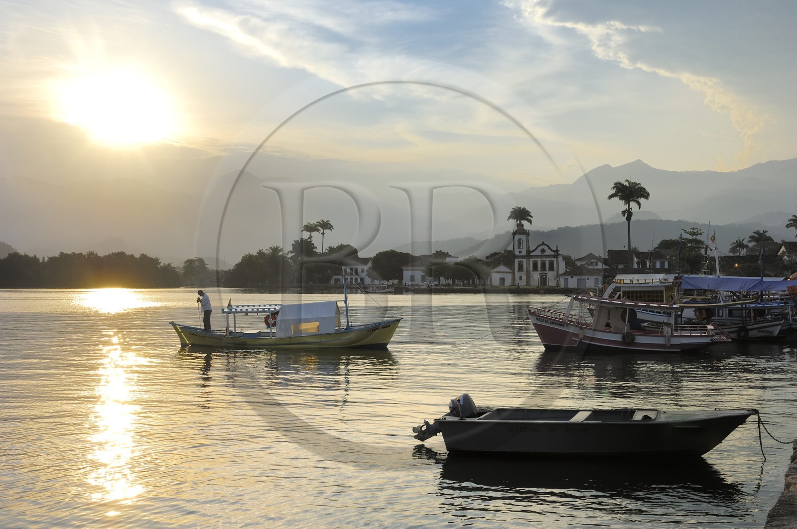 Brazil, Rio de Janeiro State, Costa Verde, Paraty, colonial town founded in 1667 to export gold to Europe, the port and Santa Rita church in the background (Gold Route, Estrada Real)