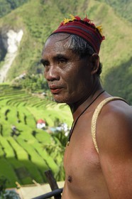 Philippines, Ifugao province, Banaue rice terraces around the village of Batad, listed as World Heritage by UNESCO, the guide Adolpho coated in the traditional Ifugao costume
