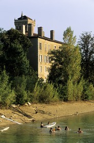 France, Gers, swimming in the pond behind Latour castle at Miramont Latour