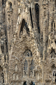 Spain, Catalonia, Barcelona, Eixample district, Sagrada Familia basilica by Catalan modernist architect Antoni Gaudi, listed as a UNESCO World Heritage Site, facade of the Nativity