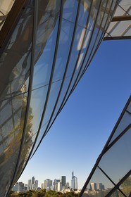 France, Paris, Louis Vuitton Foundation by architect Frank Gehry and La Defense in the background