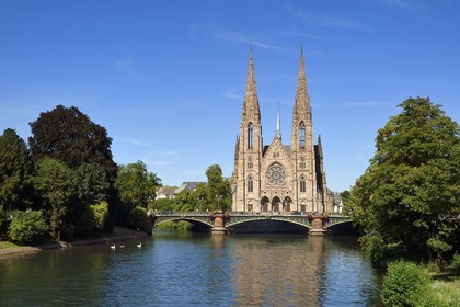 France, Bas Rhin, Strasbourg, Neustadt district dating from the German period listed as World Heritage by UNESCO, Saint Paul Protestant church and the Auvergne bridge over the Ill river