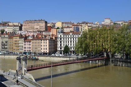 France, Rhone, Lyon, historical site listed as World Heritage by UNESCO, Quai Bondy, the Saint Vincent Footbridge over the Saone River and the Croix Rousse District in the background