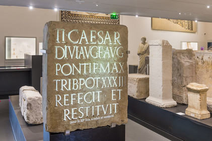 France, Gard, Nimes, Romanity museum (Musée de la Romanite) by architect Elizabeth de Portzamparc, epigraphic collection of stelae with honorary, dedicatory and funerary inscriptions, with enhancement and explanatory projection