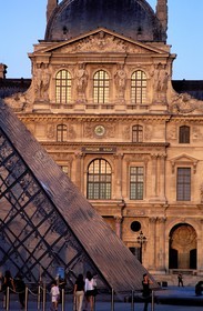France, Paris, Louvre Museum and Pyramid by the architect Ieoh Ming Pei in the middle of the Cour Carree