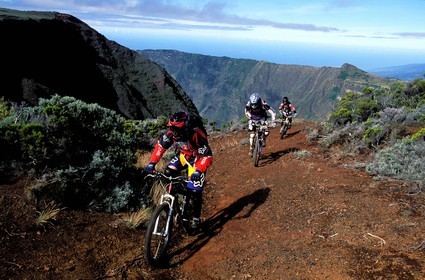 France, Reunion island (French overseas department), southeast, Piton de la Fournaise, listed as World Heritage by UNESCO, mountain bike descent on the volcano slopes