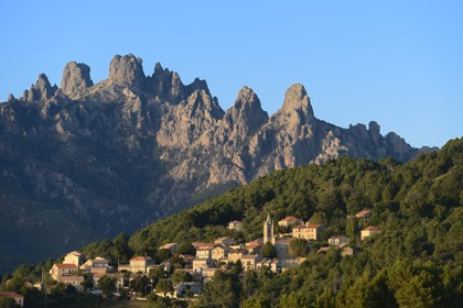 France, Corse du Sud, Alta Rocca, the village de Zonza and the Aiguilles de Bavella (Bavella Needles) in the background