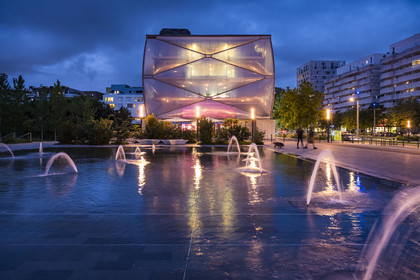 France, Herault, Montpellier, Port Marianne district, Le Nuage building by designer Philippe Starck, the water mirror in the foreground on avenue Raymond Dugrand