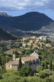 France, Haute Corse, Balagne, Notre Dame Latio (Lazio) and the village of Pigna in the background