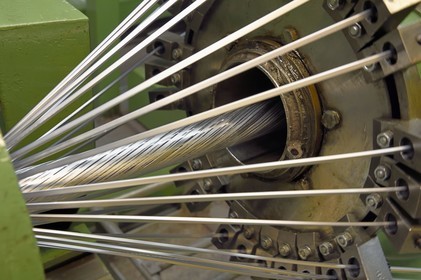 Norway, Ostfold County, Halden, Nexans cable manufacturing plant, braiding of aluminum conductors