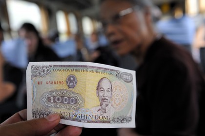 Vietnam, day train from Lao Cai to Hanoi, a 1000 dong note (5 cts of euros)