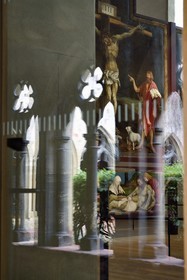 France, Haut Rhin, Colmar, Unterlinden Museum, Issenheim altarpiece credited to Grünewald, scene of the Crucifixion and Entombment of Christ, the cloister in reflection