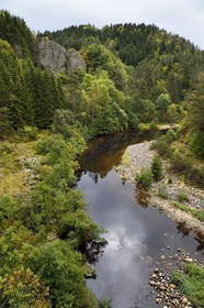 France, Haute Loire, Loire river Valley, Salettes, hiker along the banks of the Loire river at the Pont de Soubrey