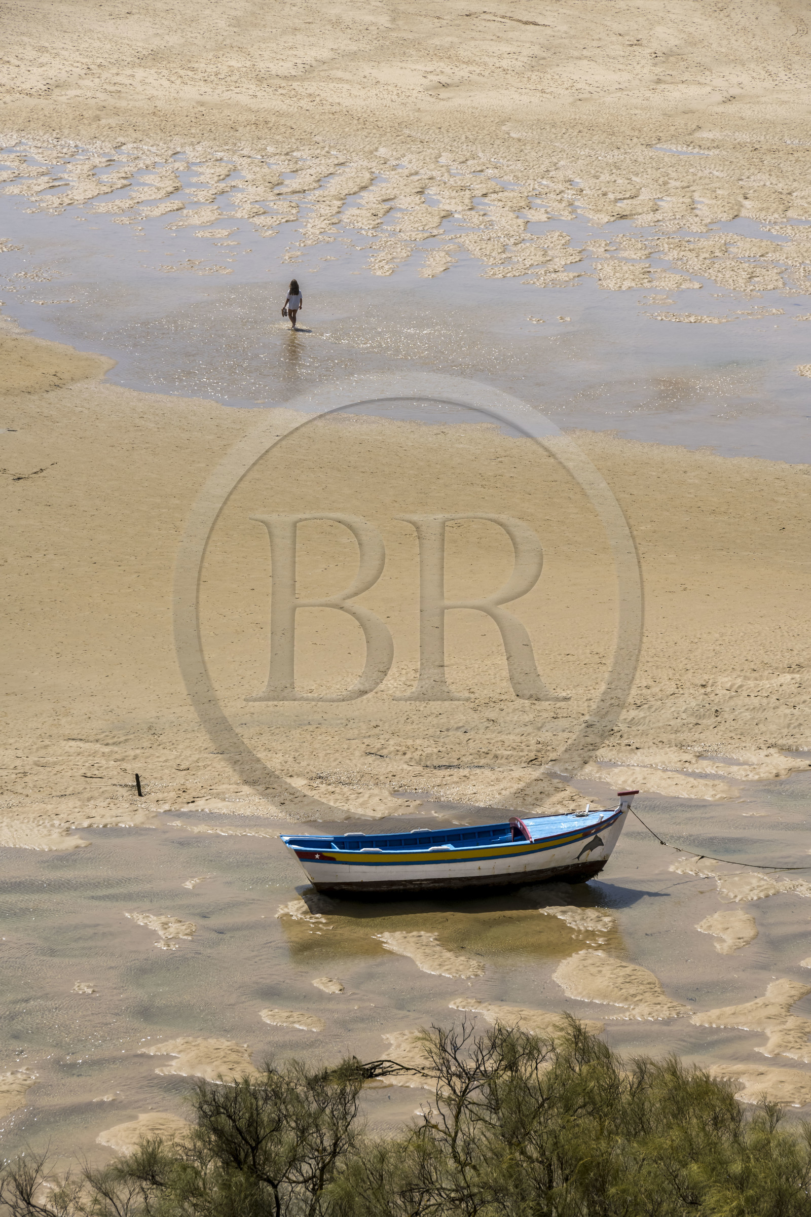 Portugal, Algarve, Ria Formosa Nature Park, Tavira, boat in the front of the fortress of the village of Cacela Velha