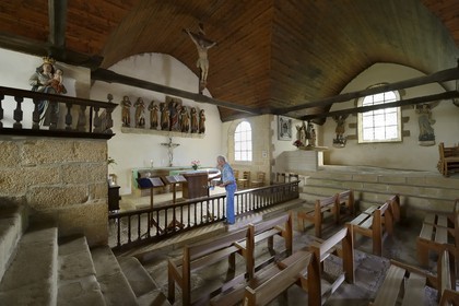 France, Cotes-d'Armor, Vieux-Marché, the Sept-Saints chapel (the Seven Saints chapel) dedicated to the Seven Sleepers of Ephesus, the choir and the statues of the seven Sleepers, on the right is the top of the dolmen transformed into a crypt