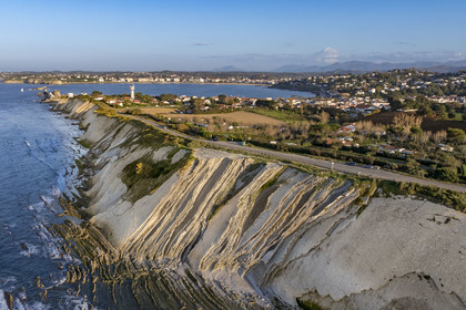 France, Pyrenees Atlantiques, Basque Country coast, the Basque Corniche, Urrugne, flysch cliffs and the fort of Socoa protecting the bay of Saint-Jean-de-Luz in the background (aerial view)