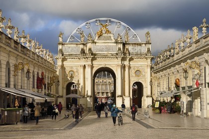 France, Meurthe-et-Moselle, Nancy, place Stanislas (former Place Royale) during the feast of Saint-Nicolas, listed as World Heritage by UNESCO, the Arc de Triomphe (Porte Héré)