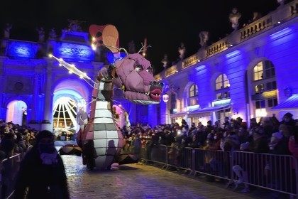 France, Meurthe-et-Moselle, Nancy, place Stanislas, the parade of Saint-Nicolas, Josephine the dragon, wild transport of the Four Seasons Company in front of the Arc de Triomphe (Porte Héré)