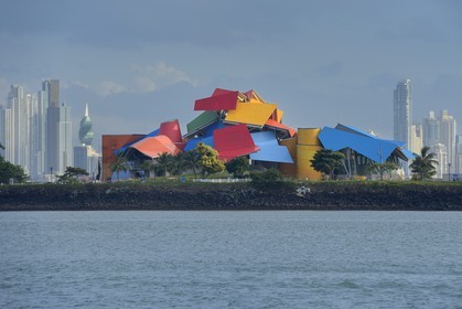 Panama, Panama City, the Biodiversity Museum named Panama Bridge of Life by architect Frank Gehry, the waterfront and skyscrapers in background
