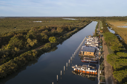 France, Gard, the Petite Camargue, Vauvert, the port of Gallician on the Rhone to Sète Canal early morning (aerial view)