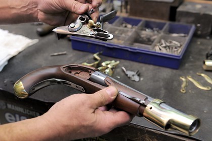 Italy, Lombardy, province of Brescia, Gardone Val Trompia, Davide Pedersoli & C manufacturer specialized in the production of historical muzzleloading guns, final assembly of a pistol
