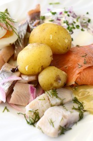 Sweden, Dalarna County, Leksand, traditional Swedish dish with smoked salmon, herring and potatoes