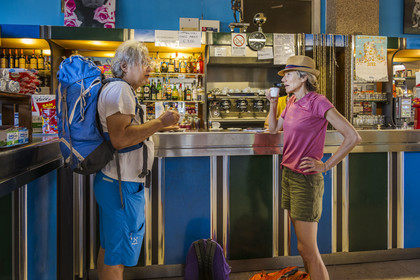 Italy, Liguria, village of Levanto north of the Cinque Terre, coffee at the counter at the station café