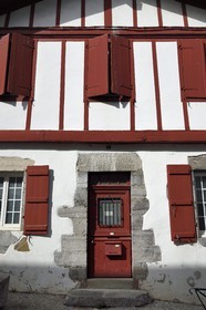 France, Pyrenees Atlantiques, Basque Country, Espelette, traditional house with carved lintel dating from 1663