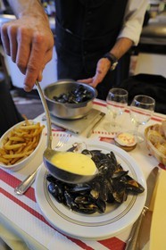 France, Calvados, Pays d'Auge, Trouville sur Mer, Les Vapeurs restaurant, the moule frites (mussels and fries) are their specialty