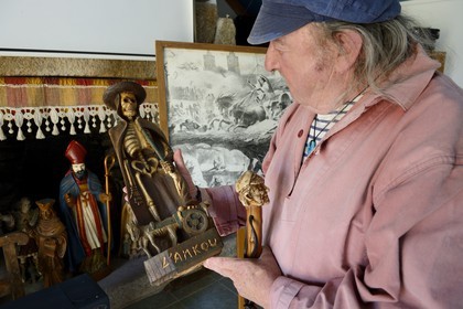 France, Finistere, Parc Naturel Regional d'Armorique (Armorica Regional Natural Park), Brennilis, Claude Le Lann shows the Ankou (personification of death in Breton mythology) at the Le Youdig Inn