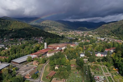 France, Haut Rhin, Husseren Wesserling, Wesserling Park, Textile Museum, the village of Fellering in the background (aerial view)